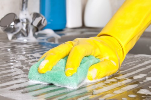 Sutton carpet cleaning specialist treating a high-traffic carpet area
